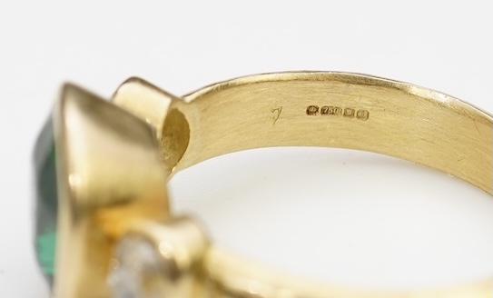 A green tourmaline and diamond ring